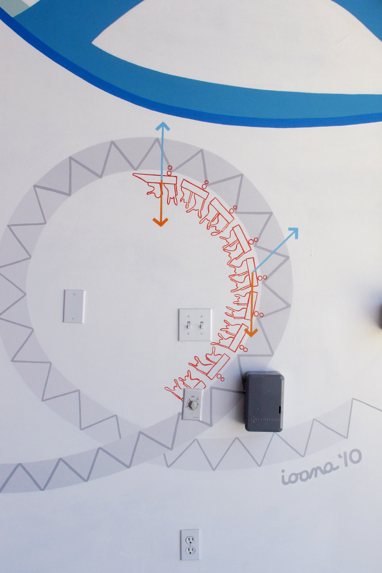 Zoom in rollercoaster as it turns upside down in a loop, becoming thinner and more abstract in the process.
                                                                Mural signature &ldquo;ioana &lsquo;10&rdquo; is right below. Colors are mostly light greys.