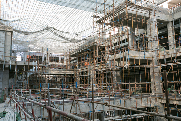 construction photo of indoor-outoor retail street under LED roof, mixed-use architecture project in Tangshan, China