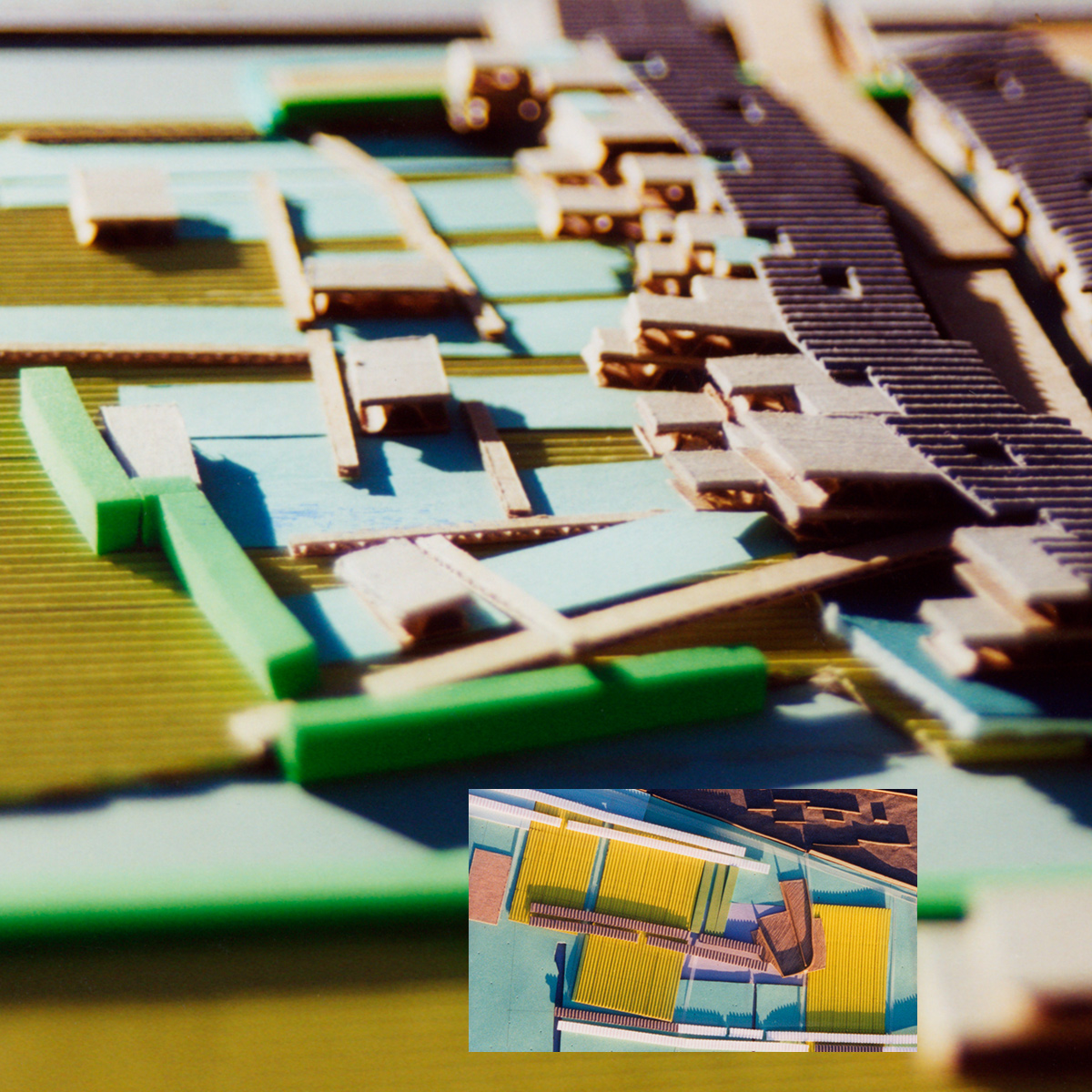an abstract model of a row of houses breaking out into green spaces, and a section showing vegetation in the center space between curved skyscrapers